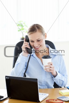Ambititous caucasian businesswoman talking on phone 
