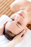 Caucasian relaxed woman having a head massage 