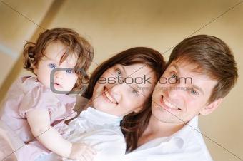 happy family smiling closeup