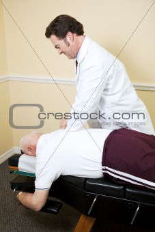 Chiropractor Adjusts Senior Man