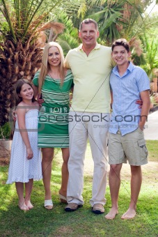 Portrait of happy family, outdoors