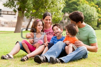Happy family having fun in the park