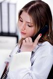 Female physician talking over phone