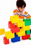 Boy playing with building blocks