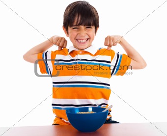 young little boy showing his strength