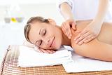 Caucasian young woman enjoying a back massage 