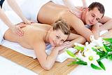 Affectionate young couple having a back massage 