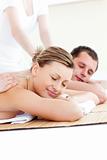 Relaxed caucasian couple enjoying a back massage 