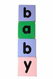 baby in toy play block letters with clipping path on white