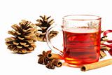 red tea cinnamon sticks star anise and conifer cone
