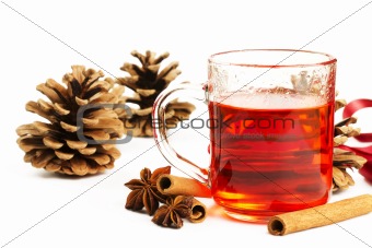 red tea cinnamon sticks star anise and conifer cone