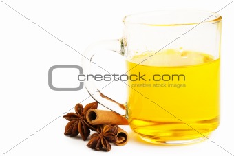 yellow tea with cinnamon sticks and star anise