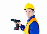 Assertive male worker holding a tool 