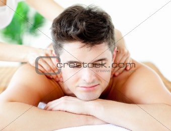Portrait of a relaxed man relaxing in a Spa center