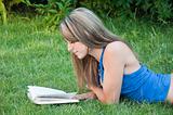 Beautiful girl reads the book 