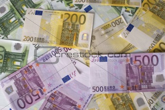 Close-up of 100, 200 and 500 Euro banknotes money. 