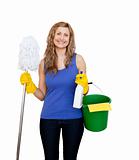 Charming young woman holding a mop 