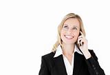 Smiling businesswoman talking on phone against white background