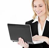 Ambitious businesswoman using her laptop 
