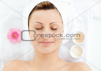 Portrait of a beautiful woman having a massage in a spa