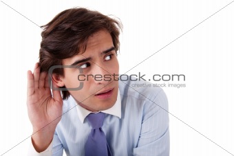 Young businessman, listening, viewing the  gesture of hand behind ear