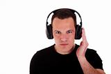 man listening music in headphones