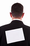 back of businessman, with a paper