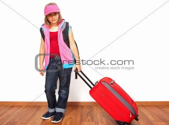 Little girl with luggage