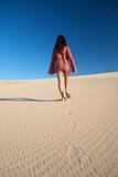 pretty woman on desert dune