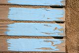 aged beach blue wooden floor on sand