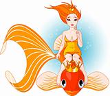 Mermaid riding on a golden fish
