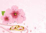 Wedding rings and cherry blossom 