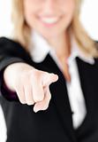 Close-up of a  young businesswoman showing with a finger at the 