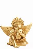golden christmas figurine with trumpet
