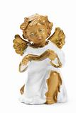 white and golden christmas angel figurine with book