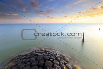 Beautiful calm sunset at the ocean in summer