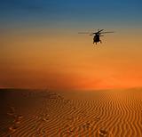 helicopter over dersert