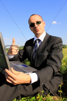 The businessman in the field