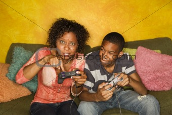 African-American family playing video game