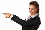 smiling modern business woman pointing finger