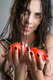 Woman holding tomatoes