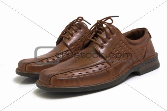 Pair of brown shoes isolated on white