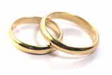 Gold wedding rings isolated on white