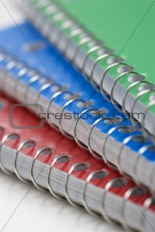 Spiral bound notebooks.