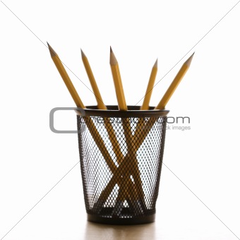 Pencils in holder.