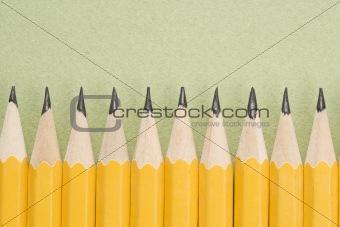 Pencils in even row.