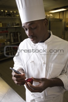 Chef carving beet.
