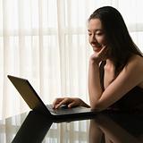 Woman on laptop.