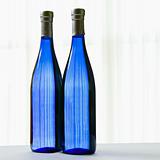 Two blue bottles.