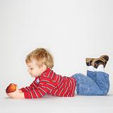 Boy with apple.